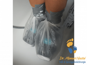 Duschen mit angelegtem Tapeverband
